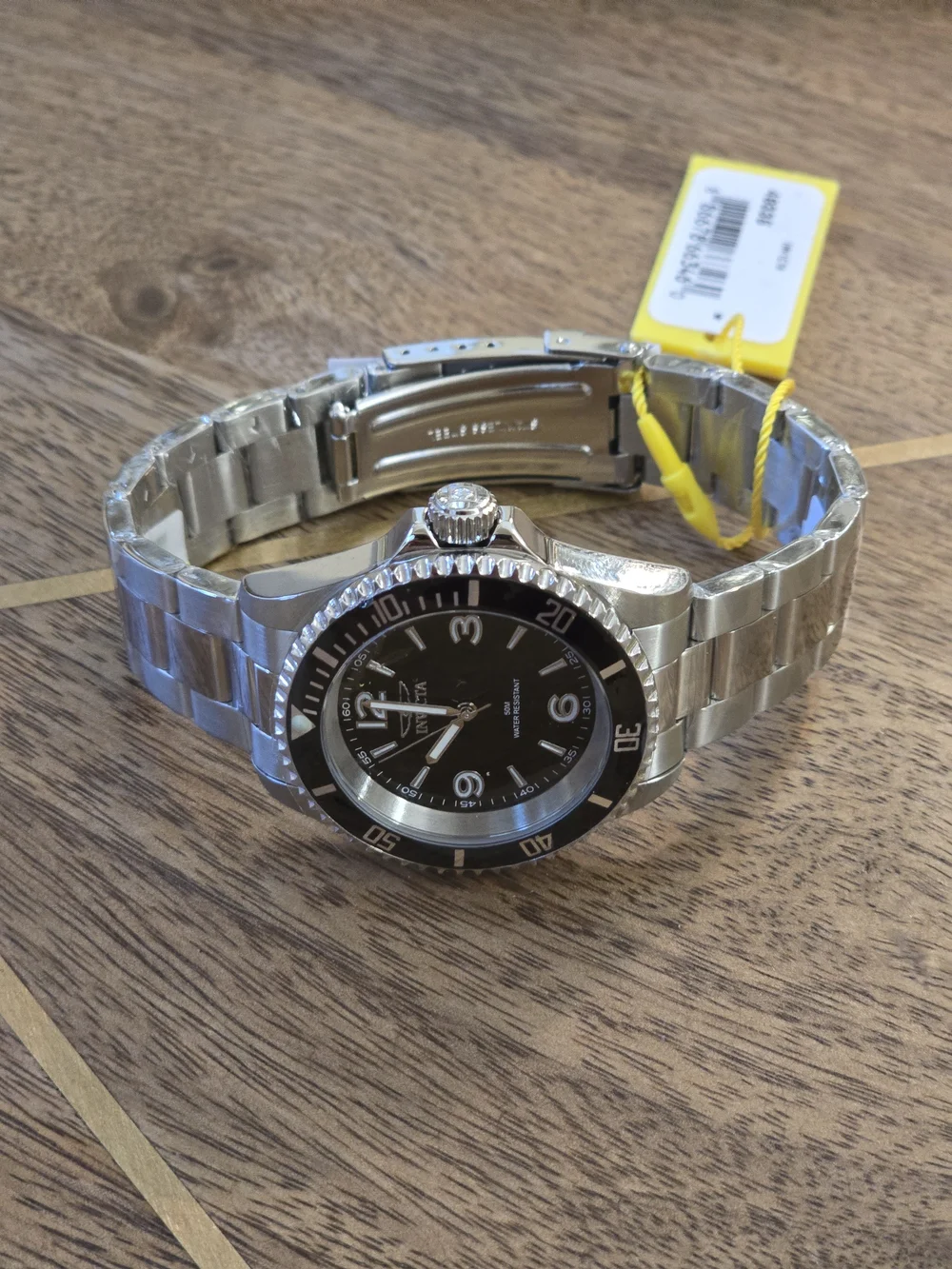 Invicta Silver Stainless Steel Watch with Black Dial and Bezel